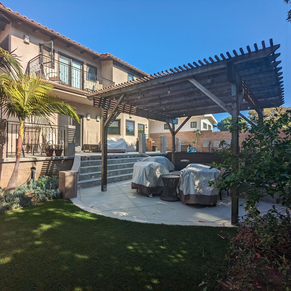 Pergola and patio set in artificial turf
