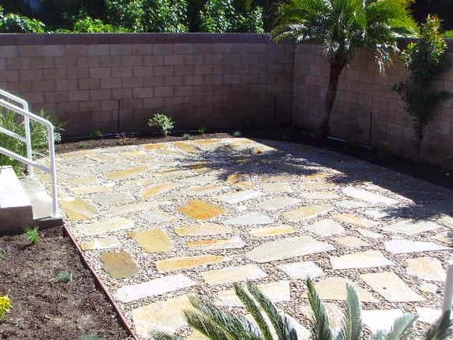 Flagstone patio set in gravel