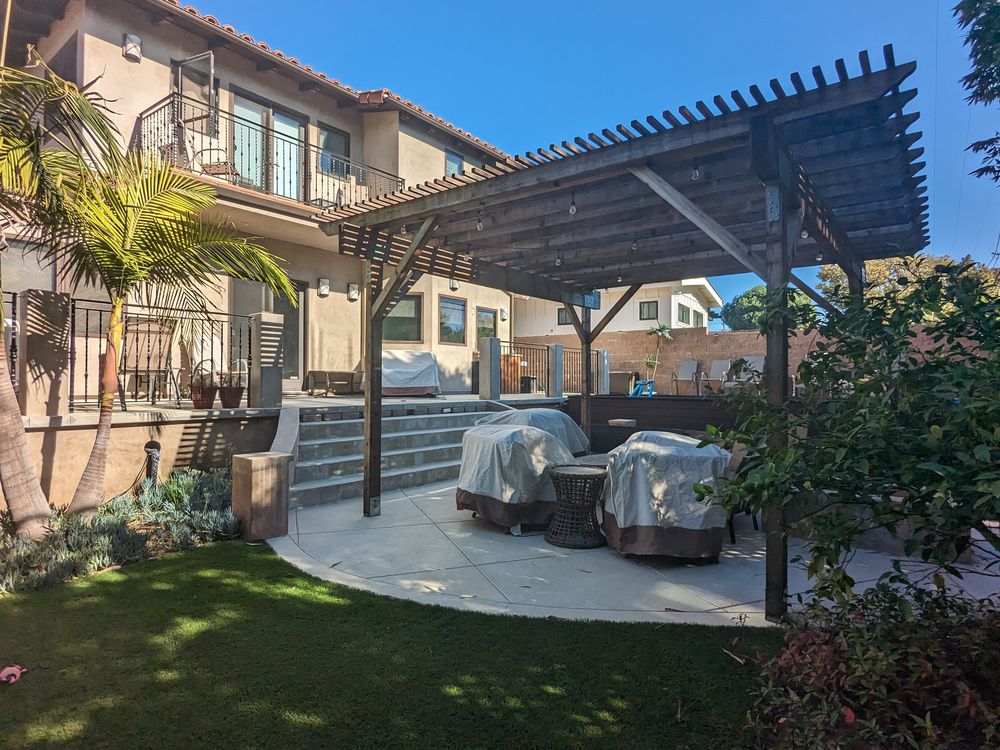 Pergola and patio set in artificial turf